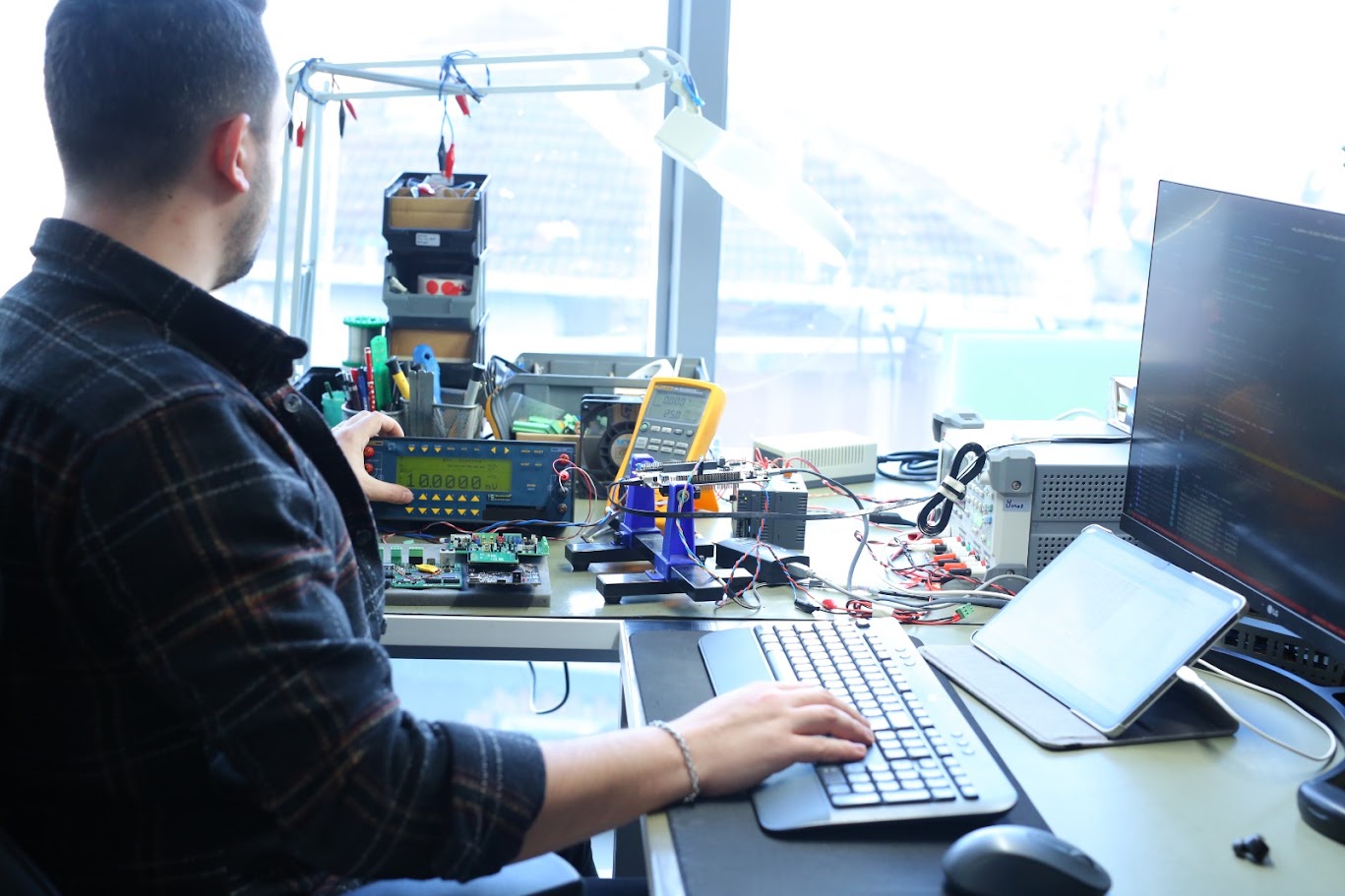Working at the lab bench with test equipment